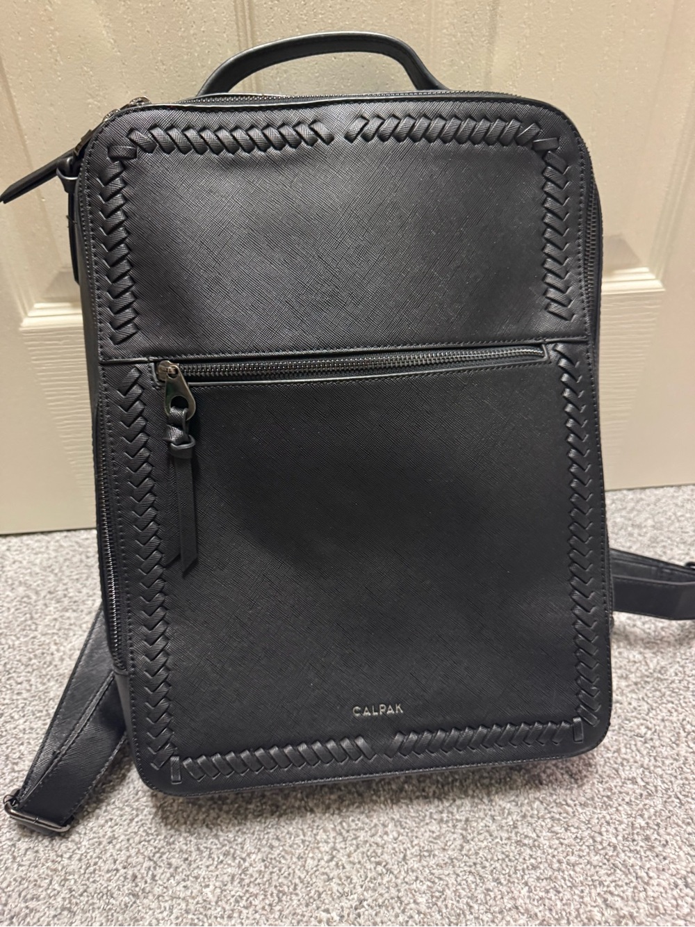 Calpak Black Leather Backpack with Woven Trim